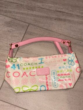 Vintage Coach pink leather and butterfly motif signature top handle mini bag